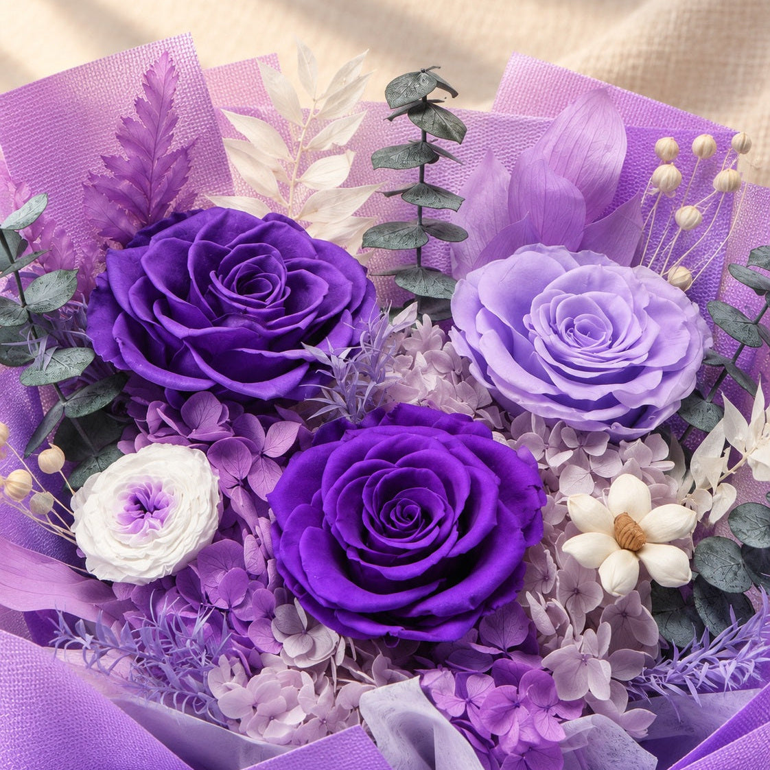 Close view of the Purple Romance Bouquet's original flowers