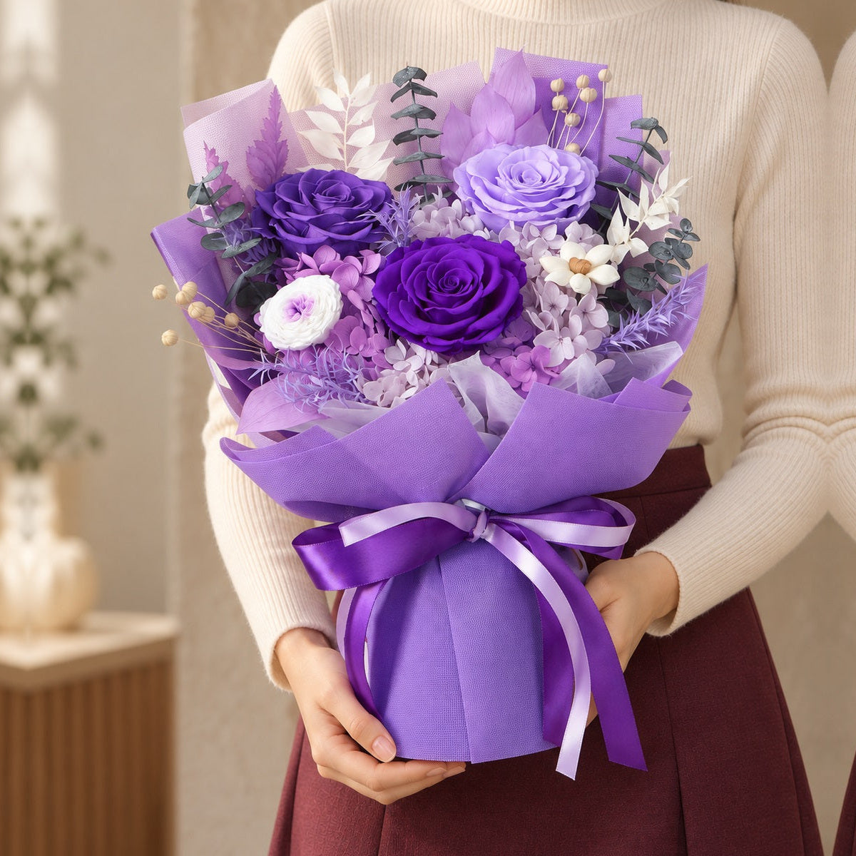 Purple Romance Bouquet held by hand at its true scale