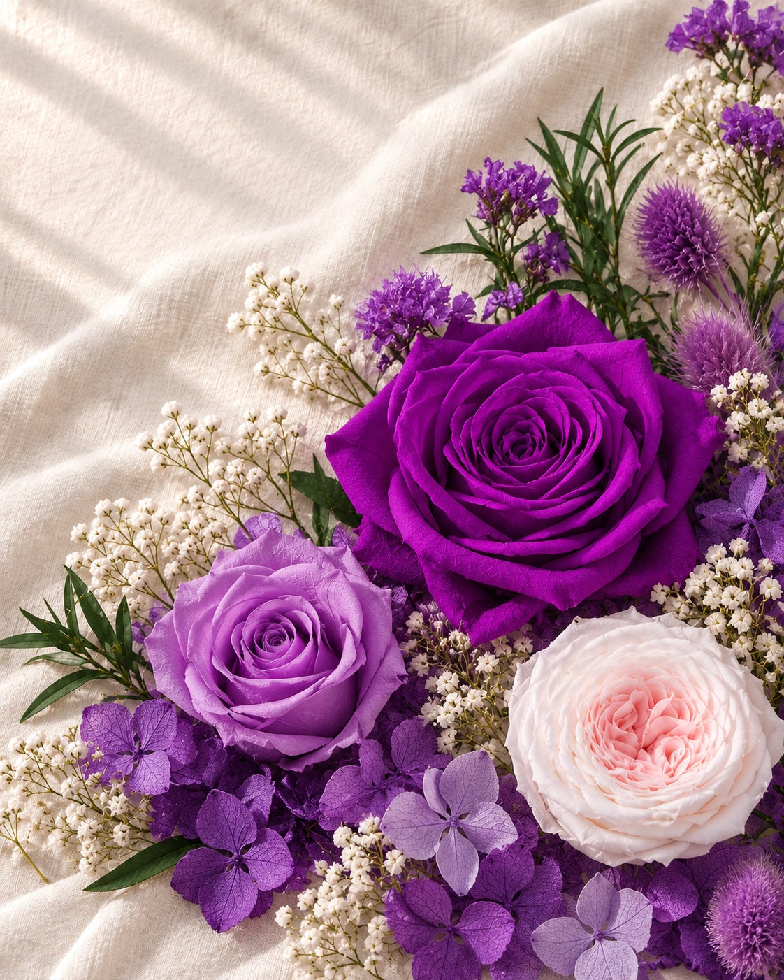 Purple preserved roses and botanical materials