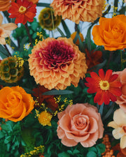 tall orange octagonal flower box: flowers without the clear cover