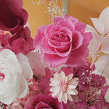 tall pink octagonal flower box: flowers without the clear cover