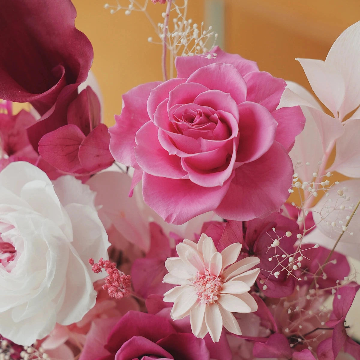 tall pink octagonal flower box: flowers without the clear cover