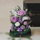 tall purple octagonal flower box: flowers without the clear cover