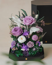 tall purple octagonal flower box: flowers without the clear cover